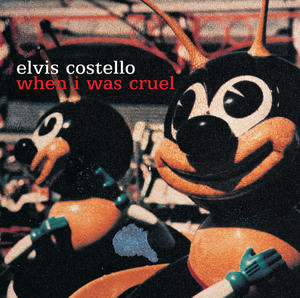 Elvis Costello《Dust 2 ...(Album Version)》[MP3_LRC]